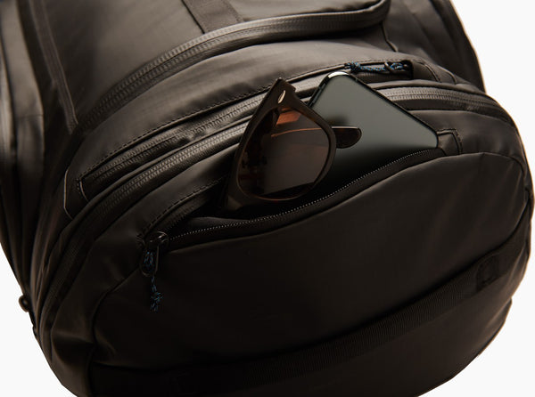 Fleece lined pocket protects eyewear and valuables