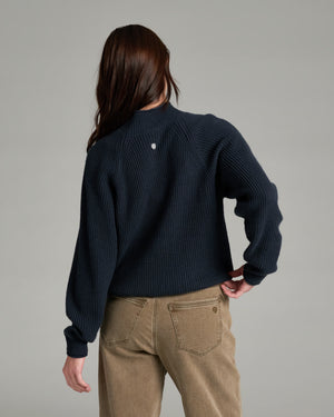 STROVA™ ROLL NECK SWEATER