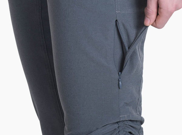 Two zippered thigh pockets with cinch access Side seam cinch converts pants to a Capri