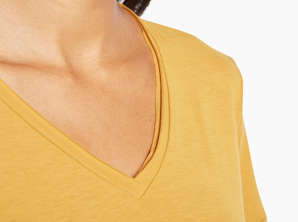 Raw edge details on cuff and neckline